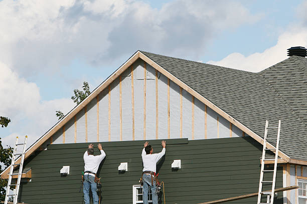 Professional Siding Installation technician working in Sanford, VA